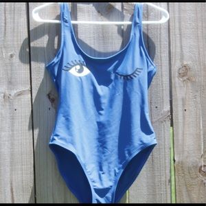 Blue winky face one piece